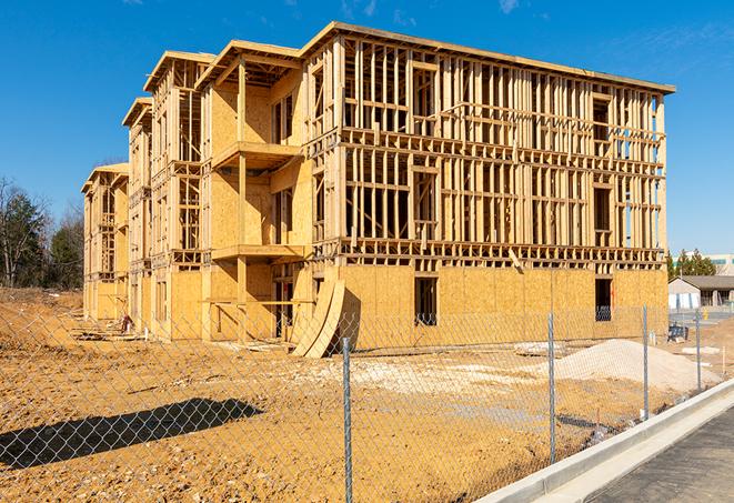 a snapshot of temporary chain link fences protecting a large construction project from unauthorized access in Colonial Heights, TN